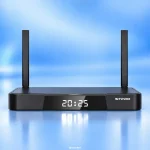 Front view of SuperBox S7 Pro with digital clock display